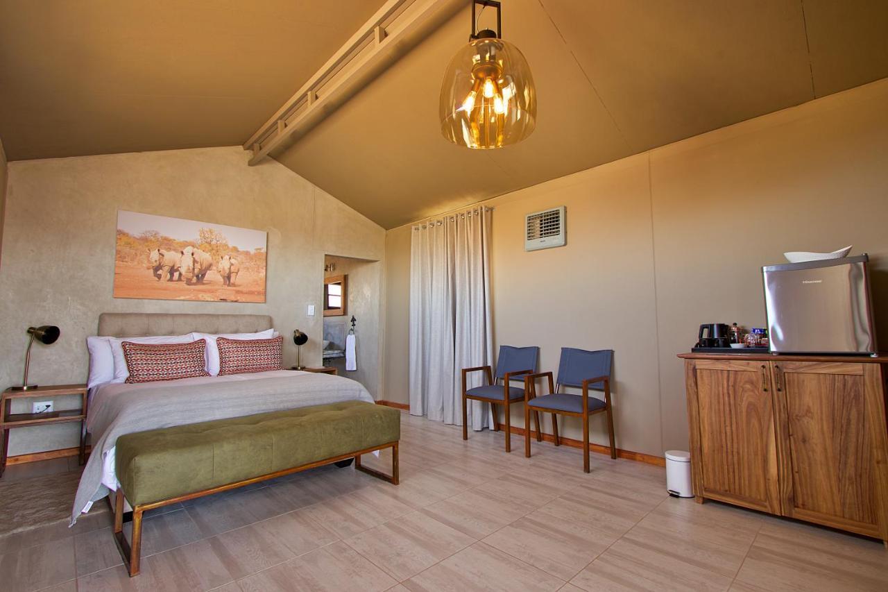 Kifaru Luxury Lodge Outjo Bagian luar foto